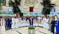 QIB executive management and employees celebrating Qatar National Day, at QIB headquarters located at Grand Hamad Street in Doha, yesterday.