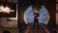 Elon Musk, co-founder and chief executive officer of Tesla Inc., speaks during an unveiling event for the Boring Company Hawthorne test tunnel in Hawthorne, south of Los Angeles, California on December 18, 2018. / AFP / POOL / Robyn Beck 