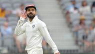 India's captain Virat Kohli gestures to the crowd on day three of the second test match between Australia and India at Perth Stadium in Perth, Australia, December 16, 2018. AAP/Richard Wainwright/via REUTERS