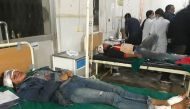 Injured Nepali passengers receive treatment at a hospital in Dang District, some 540 kilometres southwest of Kathmandu, on December 22, 2018, following a bus accident that left 23 people dead.  / AFP / 