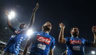 (From L) Napoli's Senegalese defender Kalidou Koulibaly, Napoli's Belgian forward Dries Mertens and Napoli's Spanish defender Raul Albiol celebrate at the end of the Italian Serie A Football match Napoli vs SPAL 2013 on December 22, 2018 at the San Paolo 