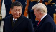 FILE PHOTO: US President Donald Trump takes part in a welcoming ceremony with China's President Xi Jinping at the Great Hall of the People in Beijing, China, November 9, 2017. REUTERS/Damir Sagolj/File Photo