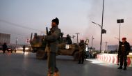 Afghan security forces stand guard at the site of an attack in Kabul, Afghanistan December 24, 2018.REUTERS/Omar Sobhani