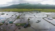 A car is seen in a rice field after a tsunami hit Sunda strait at Carita district in Pandeglang, Indonesia, December 24, 2018 in this photo taken by Antara Foto. Akbar Nugroho Gumay/ REUTERS 