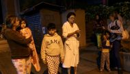 People stand on the street after an earthquake was felt across northern Venezuela, in Caracas, Venezuela December 27, 2018. REUTERS/Manaure Quitero