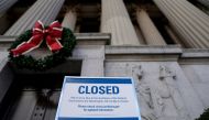 A sign declares the National Archive is closed due to a partial federal government shutdown in Washington, U.S., December 22, 2018. REUTERS/Joshua Roberts/File Photo