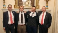 (FILES) In this file photo taken on October 16, 2018 British divers involved in the Tham Luang cave rescue in Thailand, (L-R) Chris Jewell, Connor Roe, Jim Warny and Rob Harper, pose for a photograph at a reception hosted by Britain's Prince William, Duke
