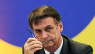 In this file photo taken on November 14, 2018 Brazil's President-elect Jair Bolsonaro, gestures during a meeting with the newly elected governors in Brasilia. (AFP / Sergio LIMA)