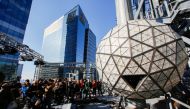 Media try to take a look of the Waterford Crystal triangles on the Times Square New Year's Eve Ball on the roof of One Times Square in the Manhattan borough of New York, U.S., December 27, 2018. REUTERS/Eduardo Munoz