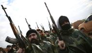 Turkish-backed Syrian fighters gather in the north of Aleppo province before heading to the Kurdish-controlled town of Manbij, on December 29, 2018. / AFP / Nazeer AL-KHATIB