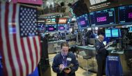 Traders and financial professionals work on the floor of the New York Stock Exchange (NYSE) ahead of the opening bell, January 4, 2019 in New York City. (Drew Angerer/Getty Images/AFP)