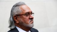 Vijay Mallya has a break outside the court house as he waits for his extradition case to be heard at Westminster Magistrates Court, in London, Britain, December 10, 2018. (REUTERS/Peter Nicholls/ File Photo)

