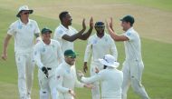 South Africa's Kagiso Rabada celebrates with team mates after taking the wicket of Pakistan's Babar Azam (REUTERS/Mike Hutchings)