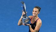 The Czech Republic's Karolina Pliskova poses with the winner's trophy following her victory over Lesia Tsurenko of Ukraine in their women's singles final match at the Brisbane International tennis tournament in Brisbane on January 6, 2019. AFP / Saeed Kha