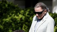 FILE PHOTO: Associate Supreme Court Justice Ruth Bader Ginsburg arrives for the swearing in ceremony of Judge Neil Gorsuch in the Rose Garden of the White House in Washington, U.S., April 10, 2017.Joshua Roberts \ REUTERS