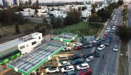 Hundreds of motorists queue at a gas station in Zapopan, Jalisco State, on January 6, 2019 as shortages have been reported in several other Mexican states. AFP / Ulises RUIZ