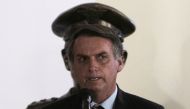 Brazil's President Jair Bolsonaro speaks at the handover of his new Defence Minister Fernando Azevedo e Silva in Brasilia on January 2, 2018. / AFP / Sergio LIMA