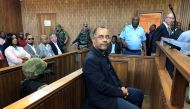 Mozambique's former finance minister Manuel Chang appears in court during an extradition hearing in Johannesburg, South Africa, January 8, 2019. REUTERS/Shafiek Tassiem