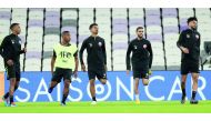 Qatari players in action during a practice session on the eve of their opening match of the AFC Asian Cup against Lebanon in Al Ain, UAE, today. 