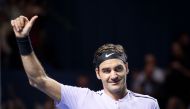 (FILES) In this file photo taken on October 28, 2017, Switzerland's Roger Federer celebrates his victory against Belgium's David Goffin in their semi-final match at the Swiss Indoors ATP 500 tennis tournament in Basel. AFP / Fabrice Coffrini 