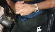 This undated handout picture released by Immigration and Checkpoints Authority of Singapore on January 8, 2019 shows a 45-year-old Singaporean man waiting in his car at the Tuas checkpoint in Singapore. AFP / Immigration And Checkpoints Authority Of Singa