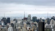 FILE PHOTO: Media helicopters fly over Paulista Avenue  in Sao Paulo, March 13, 2016. Reuters/Paulo Whitaker Whitaker