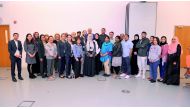 The participants of WCM-Q symposium pose for a group photo. 