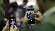 Representative image: Visitors try devices during Mobile World Congress in Barcelona, February 27, 2017.  Reuters/Eric Gaillard