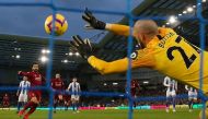 Liverpool's Mohamed Salah scores their first goal from the penalty spot Action Images via Reuters/Paul Childs