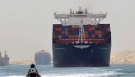 A cargo ship is seen crossing through the New Suez Canal, Ismailia, Egypt, July 25, 2015 (Reuters) 