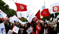 People take part in a demonstration marking the eighth anniversary of the 2011 uprising that unseated former president Zine El-Abidine Ben Ali, in Tunis, Tunisia, January 14, 2019. REUTERS/Zoubeir Souissi
