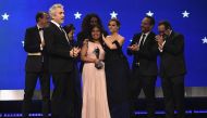 (L-R) Nicolas Celis, Alfonso Cuaron, Yalitza Aparicio, Adam Gough, Marina De Tavira, Jeff Skoll, and Eugenio Caballero accept the Best Picture award for 'Roma' onstage during the 24th annual Critics' Choice Awards at Barker Hangar on January 13, 2019, in 