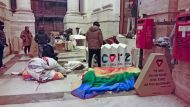 Activists hand out foldable cardboard tents to homeless people in Naples, Italy in this undated handout photo. 