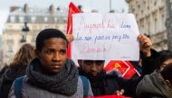 Students hold banners reading Today in the street not to end up there tomorrow on December 11, 2018 in Paris, during a demonstration against the French education system reforms (AFP) 
