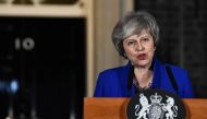 Britain's Prime Minister Theresa May makes a statement following winning a confidence vote, after Parliament rejected her Brexit deal, outside 10 Downing Street in London, Britain, January 16, 2019. REUTERS/Clodagh Kilcoyne