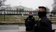 U.S. Secret Service Uniformed Division officers stand in front of White House as they continue to work without pay due to the government shutdown, in Washington, U.S., January 19, 2019. REUTERS/Yuri Gripas