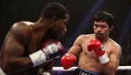 Manny Pacquiao (R) squares up with Adrien Broner during the WBA welterweight championship at MGM Grand Garden Arena on January 19, 2019, in Las Vegas, Nevada. Christian Petersen/Getty Images/AFP 