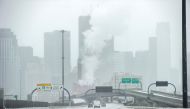 Ice and snow cover Interstate 93 through the city during Winter Storm Harper in Boston, Massachusetts on January 20, 2019. AFP / Joseph Prezioso 