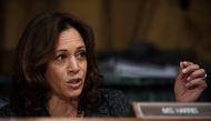 FILE PHOTO: Sen. Kamala Harris, D-CA, talks to Christine Blasey Ford, testifying before the U.S. Senate Judiciary Committee on Capitol Hill in Washington, U.S., September 27, 2018. Saul Loeb/Pool via REUTERS/File Photo