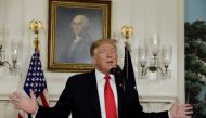 FILE PHOTO: US President Donald Trump delivers remarks on border security and the partial shutdown of the US government from the Diplomatic Room at the White House in Washington, US, Jan. 19, 2019. REUTERS/Yuri Gripas/File Photo