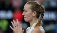 Czech Republic's Petra Kvitova applauds and reacts after winning the women's singles quarter-final match against Australia's Ashleigh Barty on day nine of the Australian Open tennis tournament in Melbourne on January 22, 2019. AFP / DAVID GRAY 
