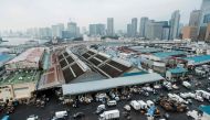 (FILES) This file photo taken on October 6, 2018, shows a general view of morning activities at the landmark Tsukiji fish market following the market's final morning auctions before closing its doors in Tokyo. AFP / Nicolas Datiche