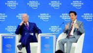 Japanese Prime Minister Shinzo Abe and Executive Chairman of the WEF Klaus Schwab attend the World Economic Forum (WEF) annual meeting in Davos, Switzerland, January 23, 2019. Reuters/Arnd Wiegmann