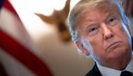 (FILES) In this file photo taken on January 11, 2019, US President Donald Trump listens during a meeting on border security in the Cabinet Room of the White House in Washington, DC. AFP / Brendan Smialowski