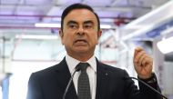(FILES) In this file photo taken on November 8, 2018 Chairman and CEO of Renault-Nissan-Mitsubishi Carlos Ghosn gestures as he delivers a speech during a visit of French President at the Renault factory, in Maubeuge, northern France. AFP / Ludovic MARIN