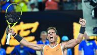 Spain's Rafael Nadal celebrates his victory against Greece's Stefanos Tsitsipas during their men's singles semi-final match on day 11 of the Australian Open tennis tournament in Melbourne on January 24, 2019. AFP / William West