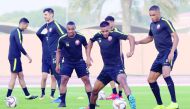 Qatari players take part in a practice session ahead of their AFC Asian Cup Quarter-final match against South Korea which will be played in Abu Dhabi, today.