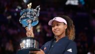 Japan's Naomi Osaka poses with the trophy after winning her match against Czech Republic's Petra Kvitova. REUTERS/Lucy Nicholson