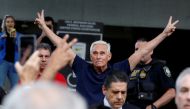 Roger Stone reacts as he walks to microphones after his appearance at Federal Court in Fort Lauderdale, Florida, U.S., January 25, 2019. REUTERS/Joe Skipper TPX IMAGES OF THE DAY