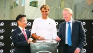 Rafael Nadal (centre) with officials of Kia Motors Corporation.